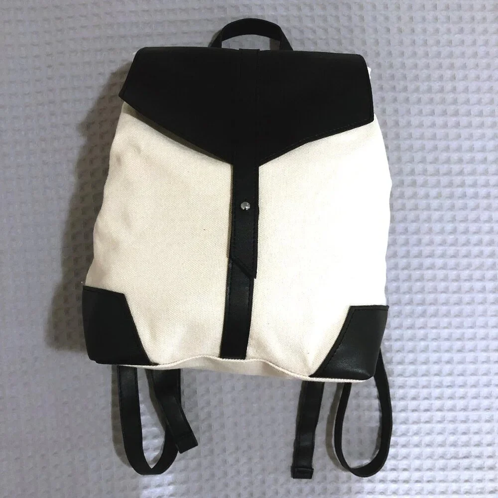 NWOT Deux Lux Black PU Leather White Canvas Backpack